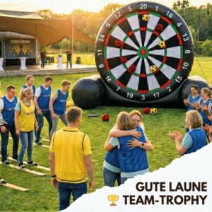 Teambuilding-Action pur: Die Gute Laune Team-Trophy mit XXL Fußball-Dart und Rasen-Ski für motivierte Teams beim Firmenevent.